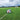 Robot in field driving away